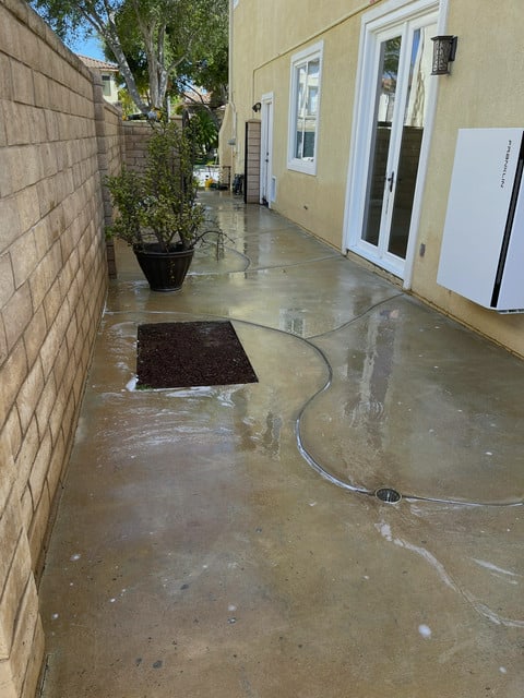 After: paved dog run restored